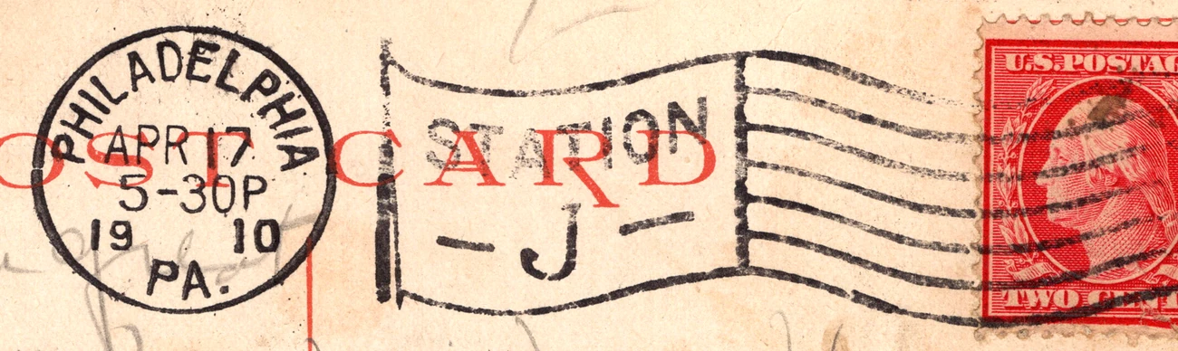 A circular Station J postmark dated 1910 on a postcard, from the Postcard Origins collection