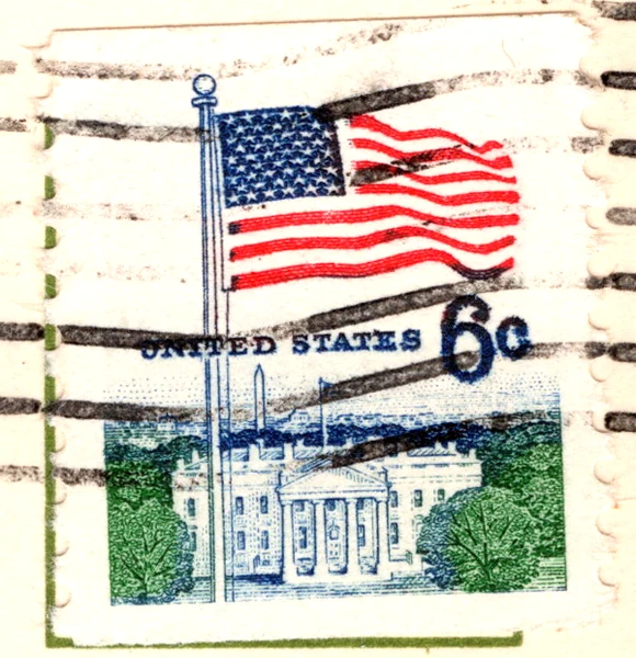 A 6-cent Flag over the White House definitive stamp on a postcard, from the Postcard Origins collection